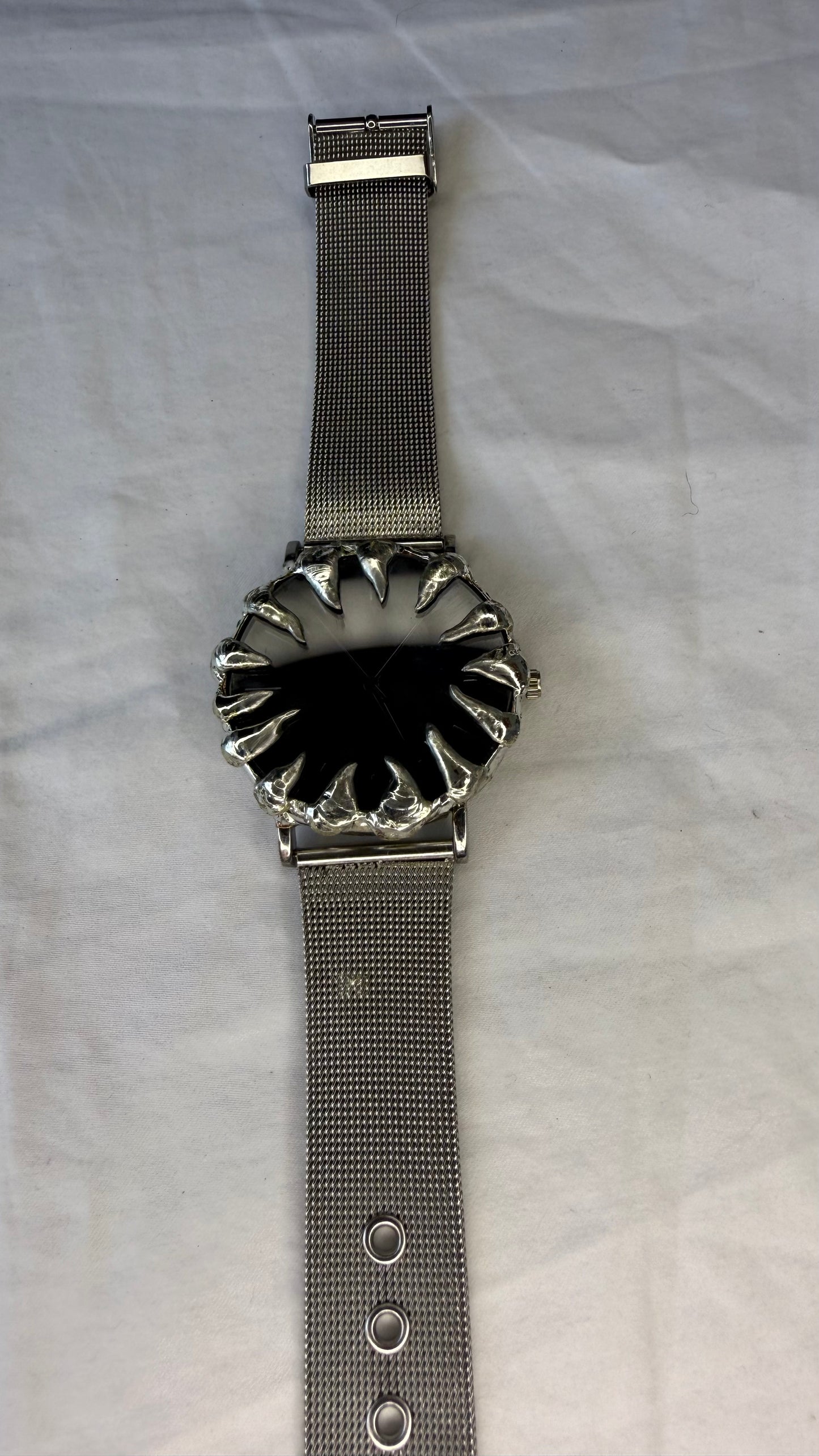 Black spiked watch