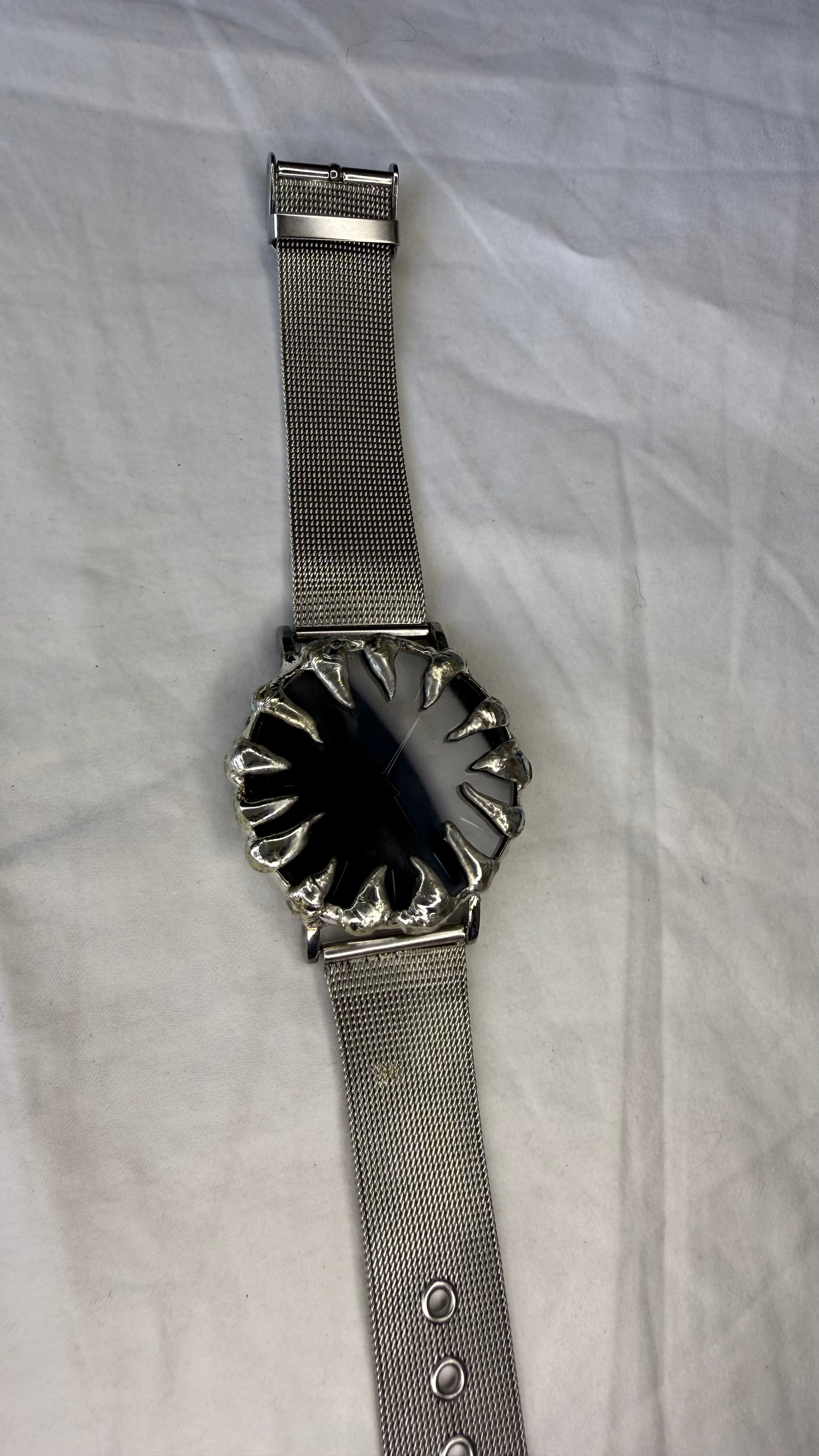 Black spiked watch