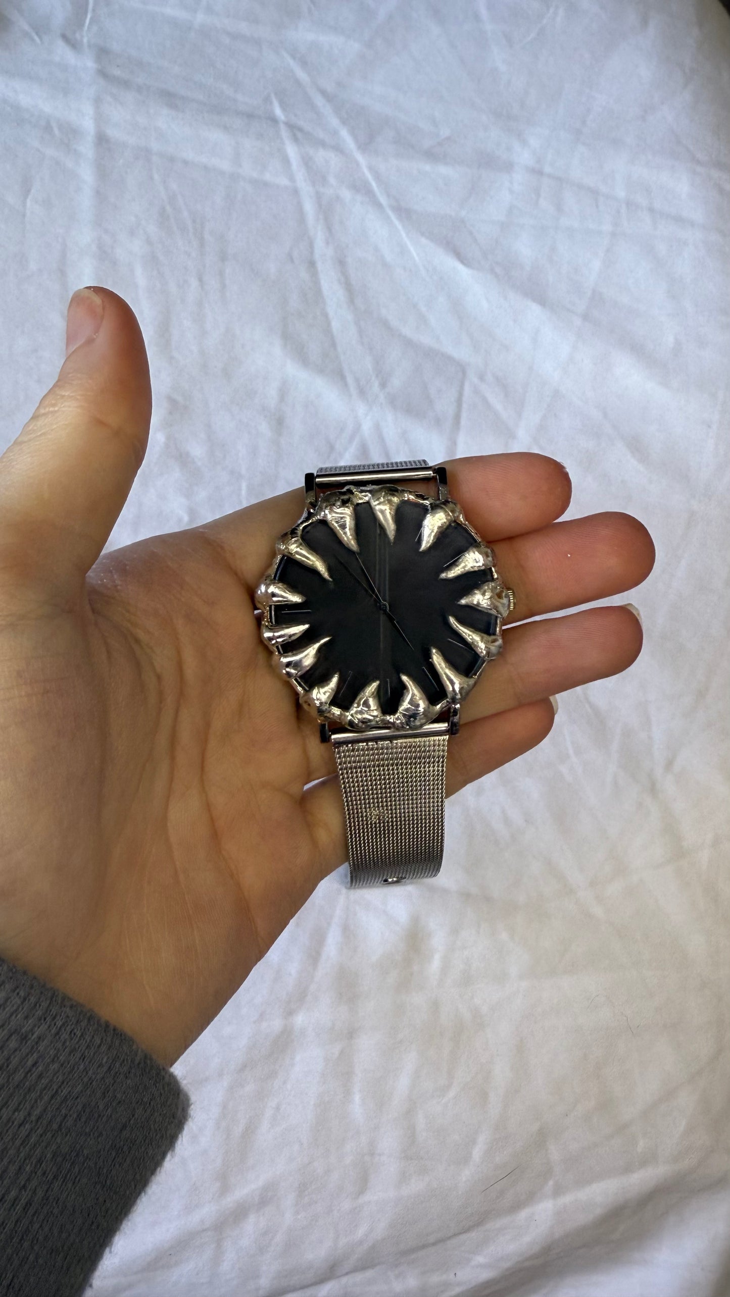 Black spiked watch