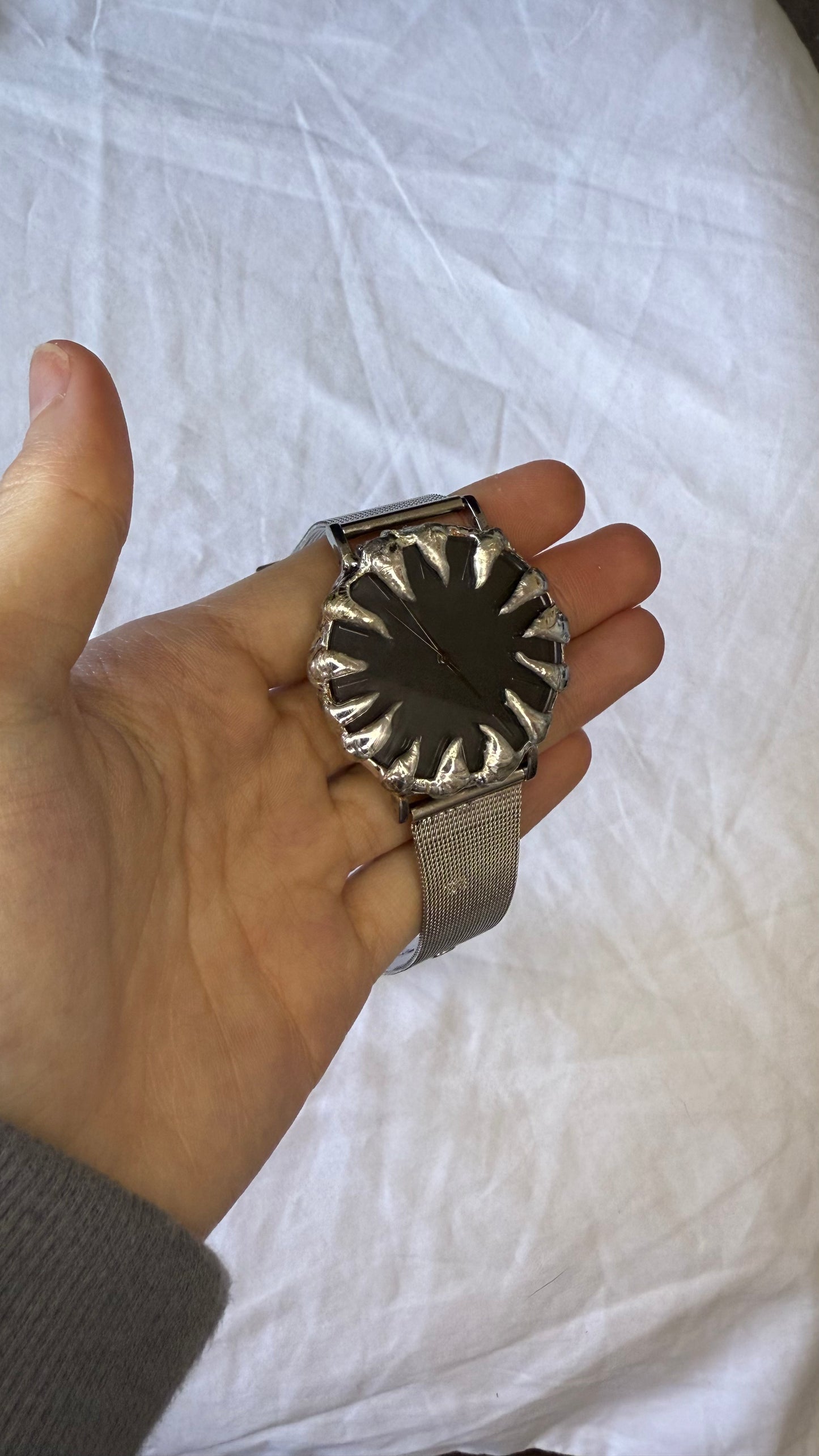 Black spiked watch