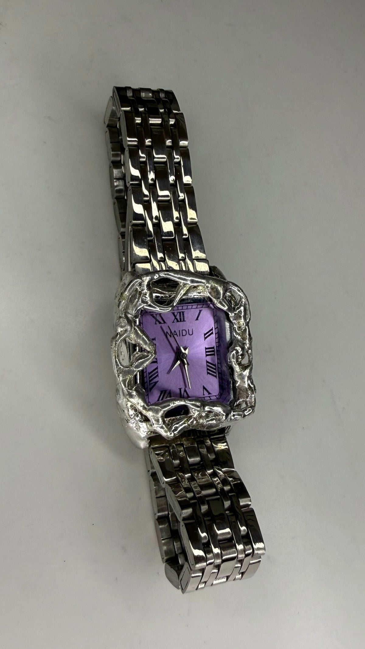Purple wavy watch – Scorchedvalley