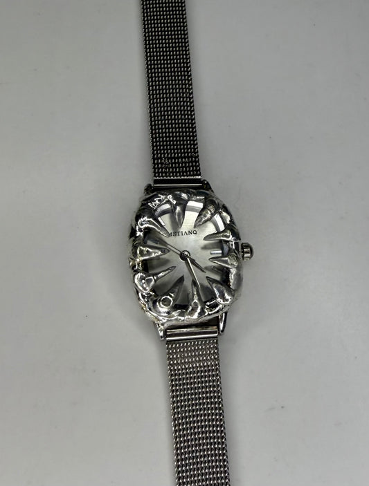Inward Spiked Watch