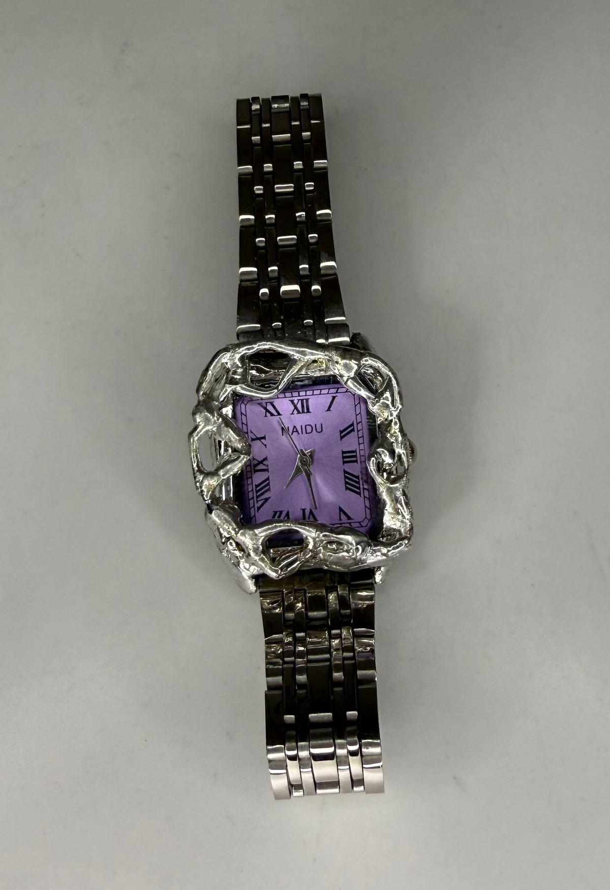 Purple wavy watch – Scorchedvalley