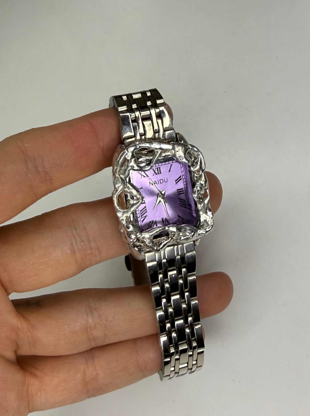 Purple wavy watch – Scorchedvalley